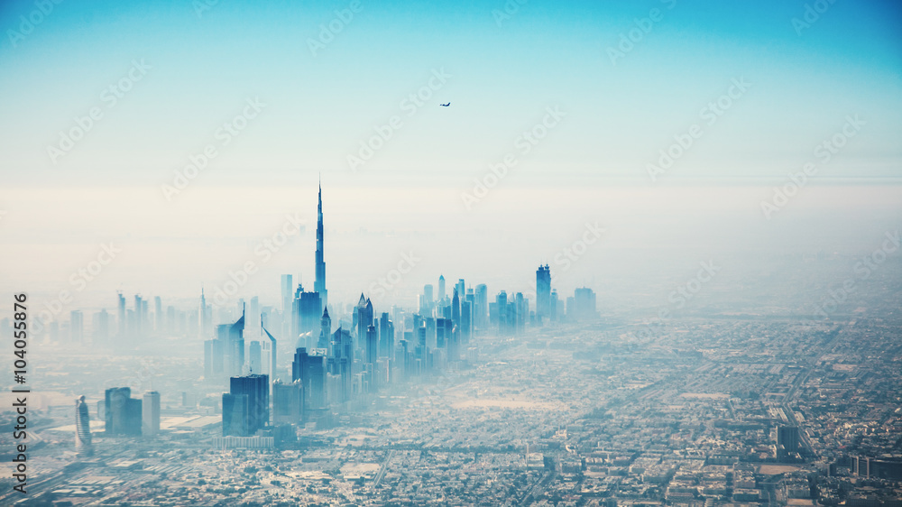 Fototapeta Dubai city in sunrise aerial
