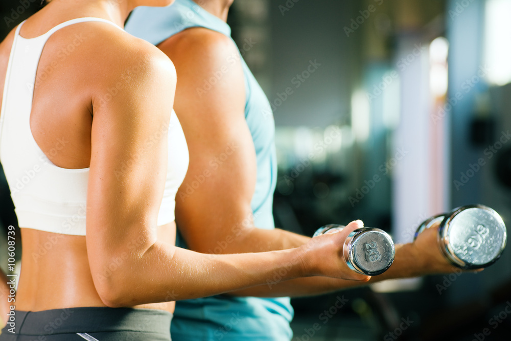 Obraz Tryptyk Fitness Couple in gym