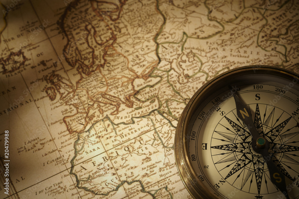 Obraz Kwadryptyk vintage compass on a map