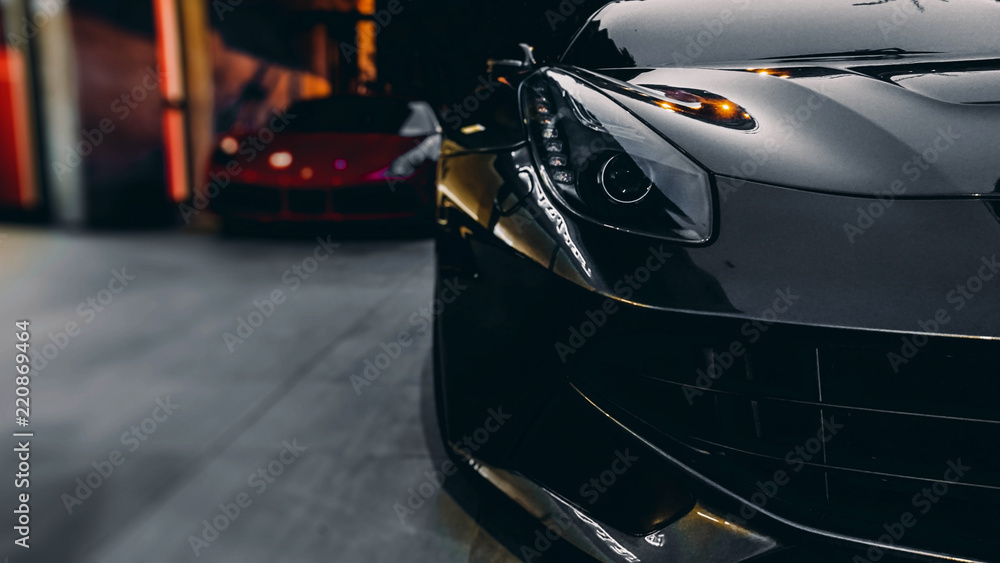 Obraz Tryptyk Front of a sports car - black