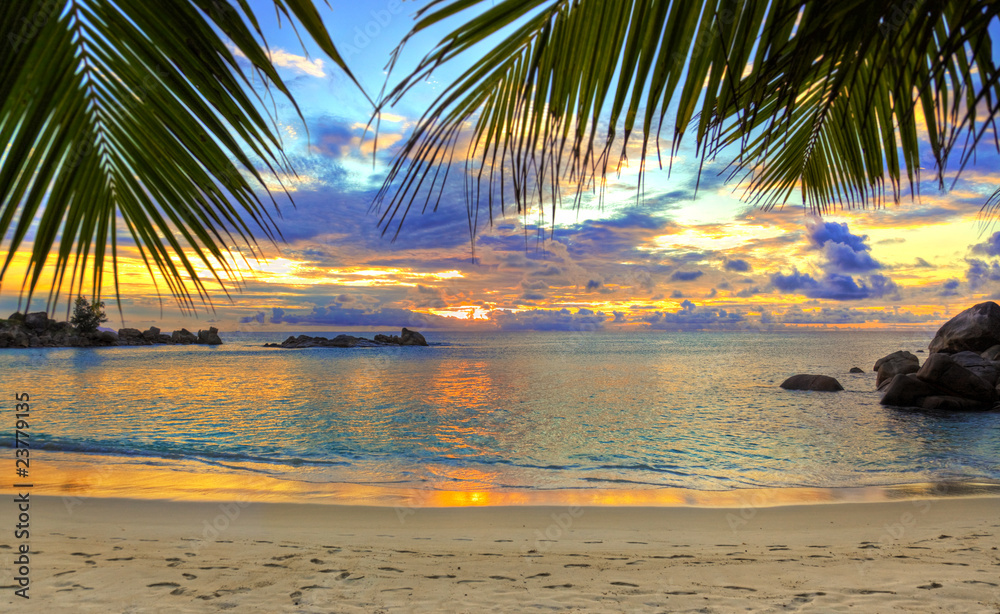 Obraz na płótnie Tropical beach at sunset