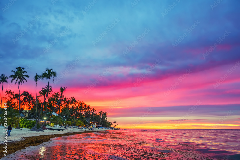 Fototapeta Vibrant sunset over tropical
