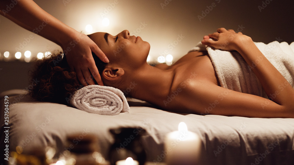 Obraz Tryptyk Girl having massage and