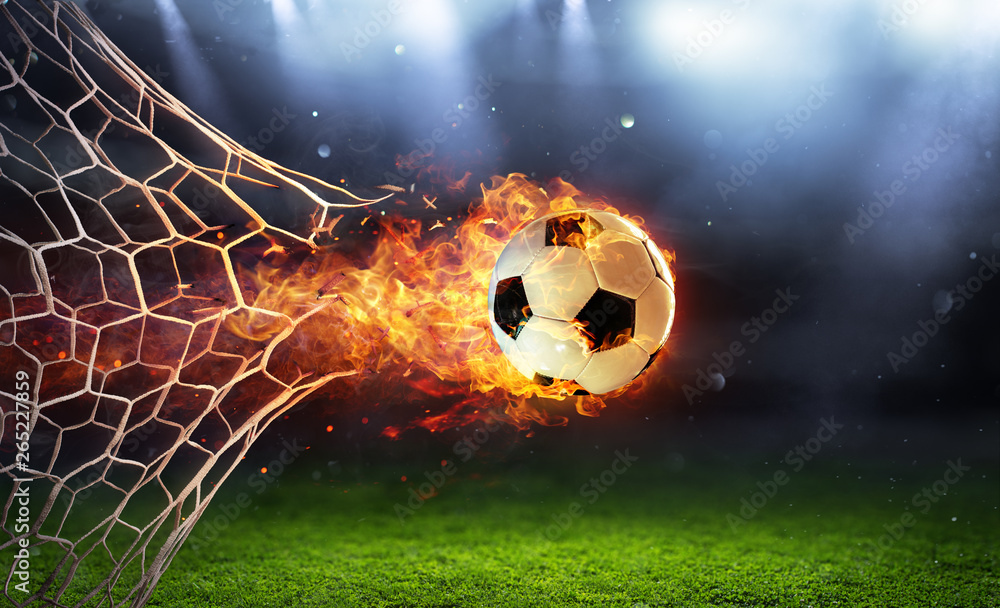 Obraz Tryptyk Fiery Soccer Ball In Goal With