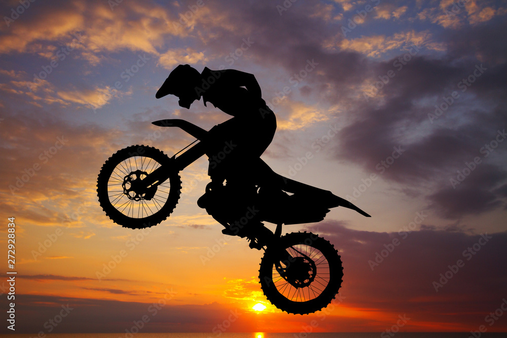 Obraz Dyptyk freestyle motocross at sunset