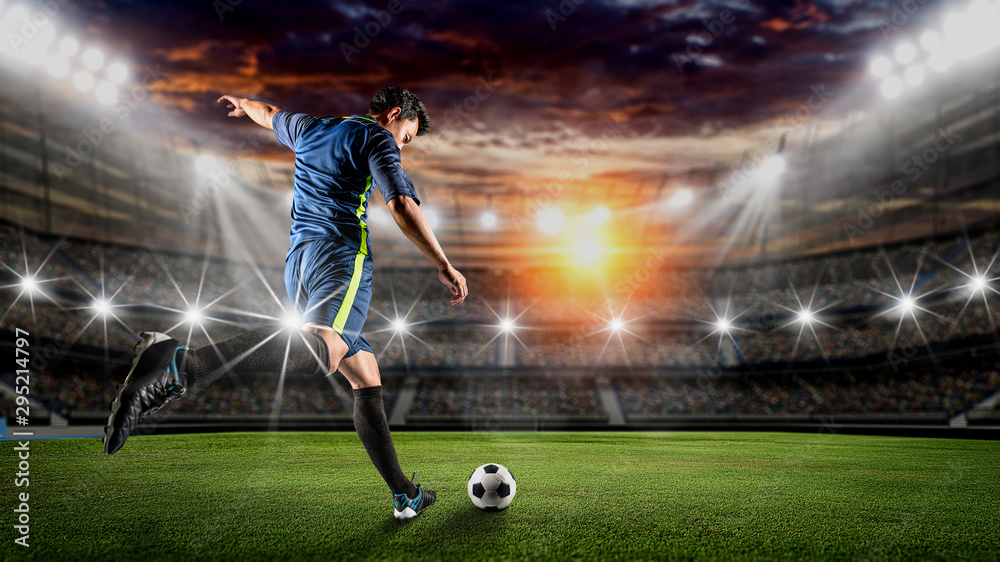 Obraz Tryptyk Soccer player kicks the ball