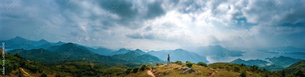 Obraz Pentaptyk Panorama of Man hiking in