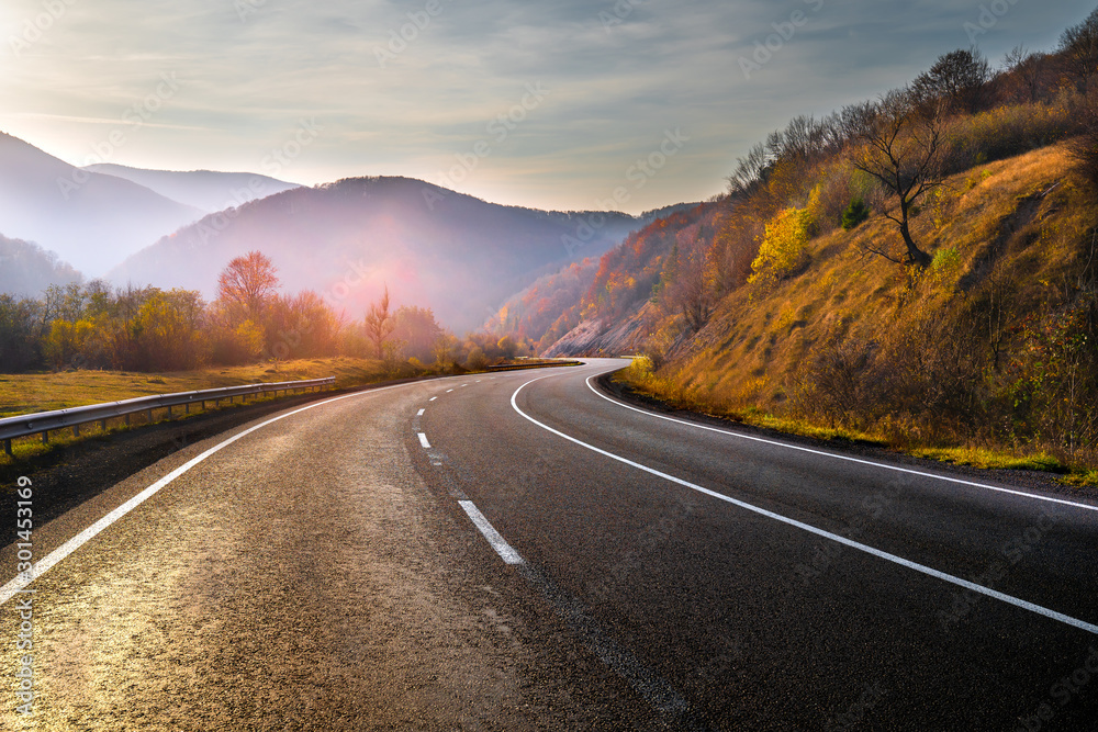 Fototapeta Highway in mountains in autumn