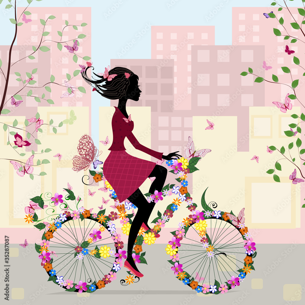 Fototapeta Girl on a bicycle in the city