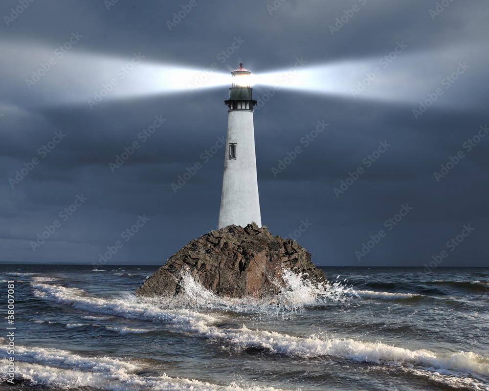 Fototapeta Lighthouse with a beam of