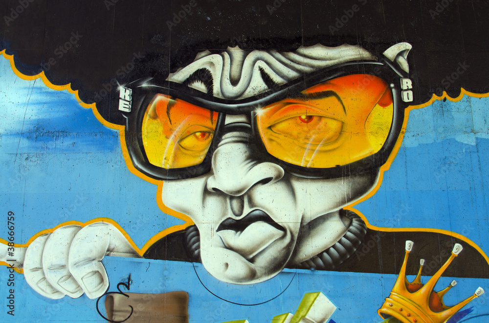 Fototapeta Graffiti cara con gafas.