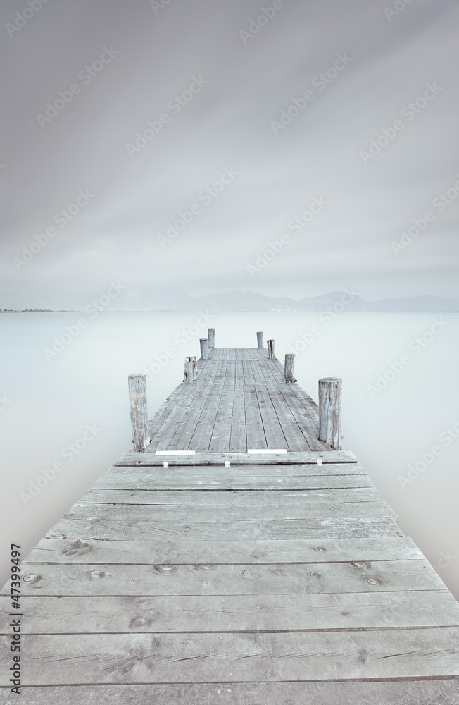 Obraz Tryptyk Wooden pier on lake in a