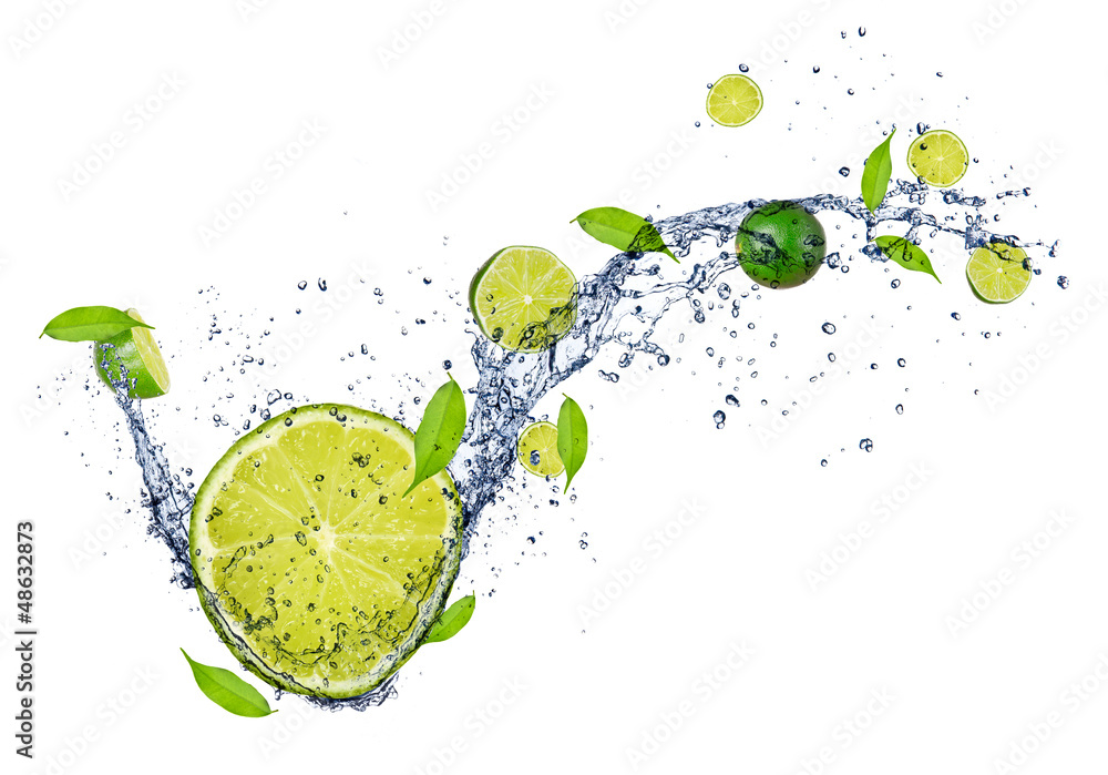 Fototapeta  Fresh limes in water splash,