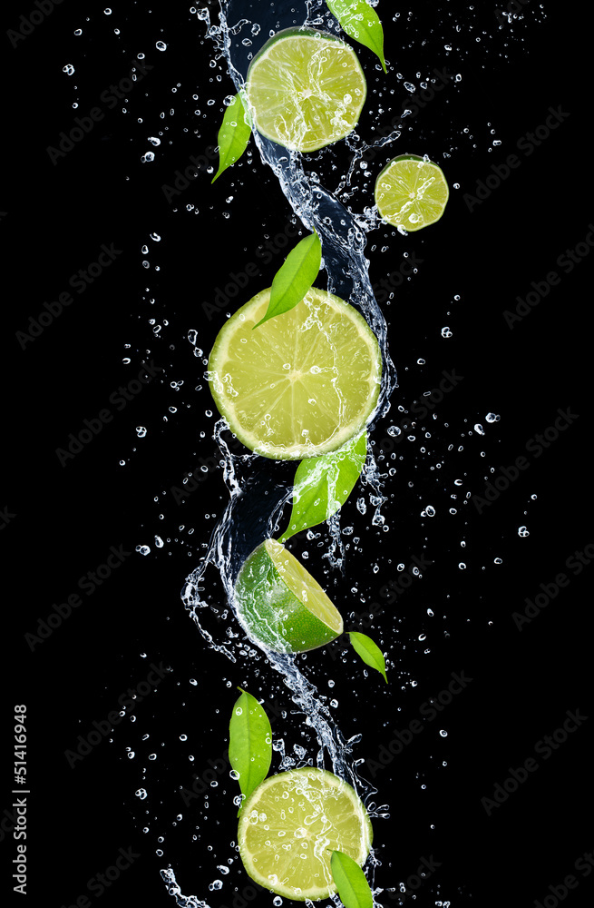 Fototapeta Limes in water splash,