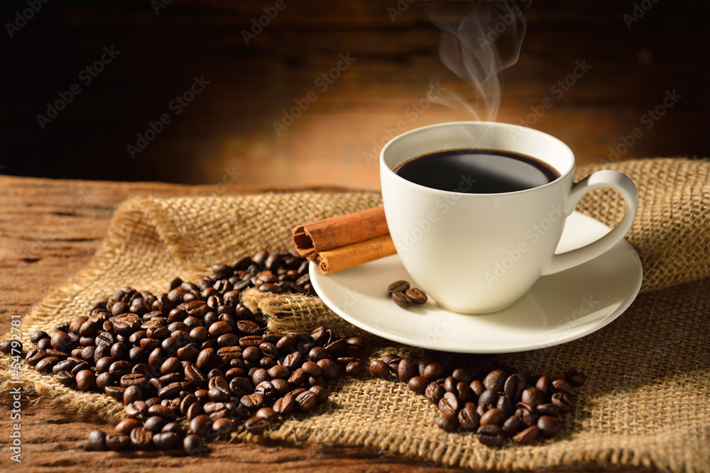 Fototapeta Coffee cup and coffee beans on