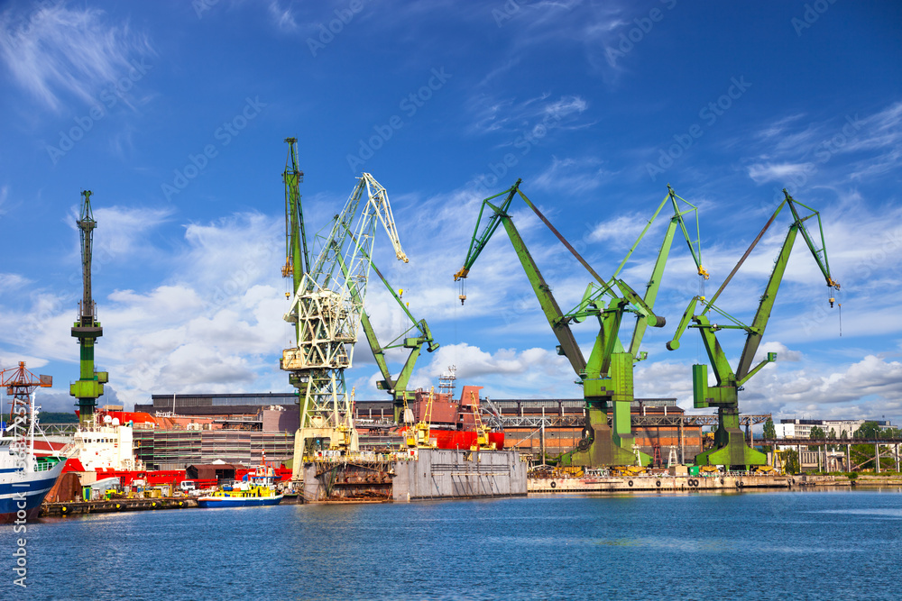 Obraz Tryptyk Big cranes and dock at the