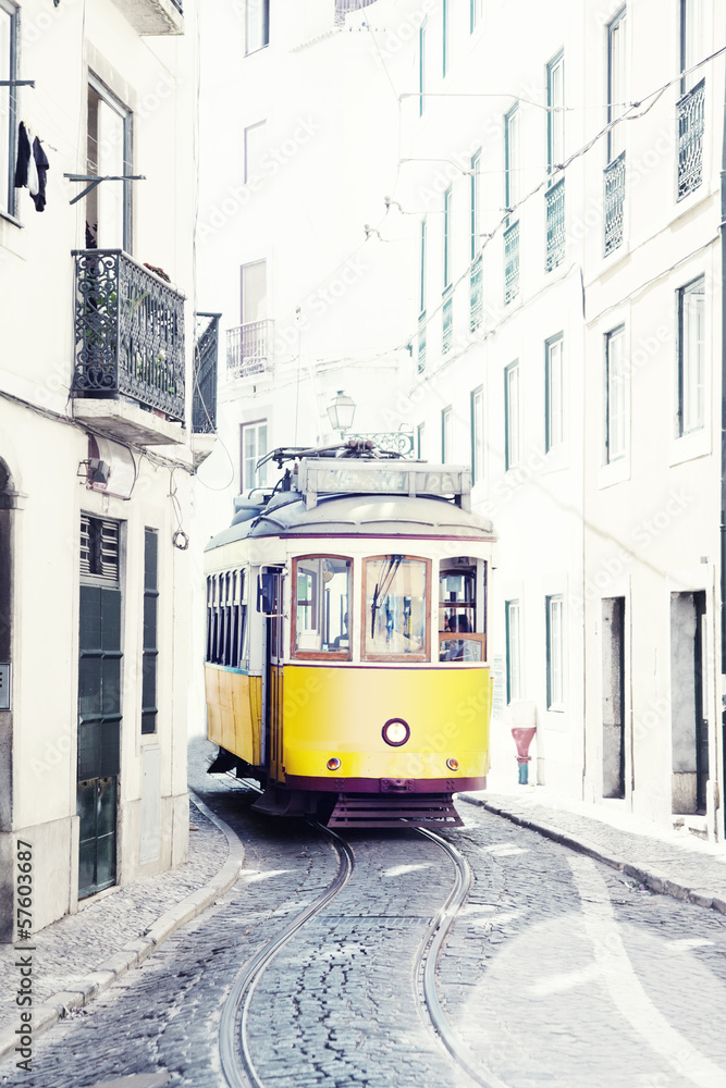 Fototapeta yellow ancient tram on streets