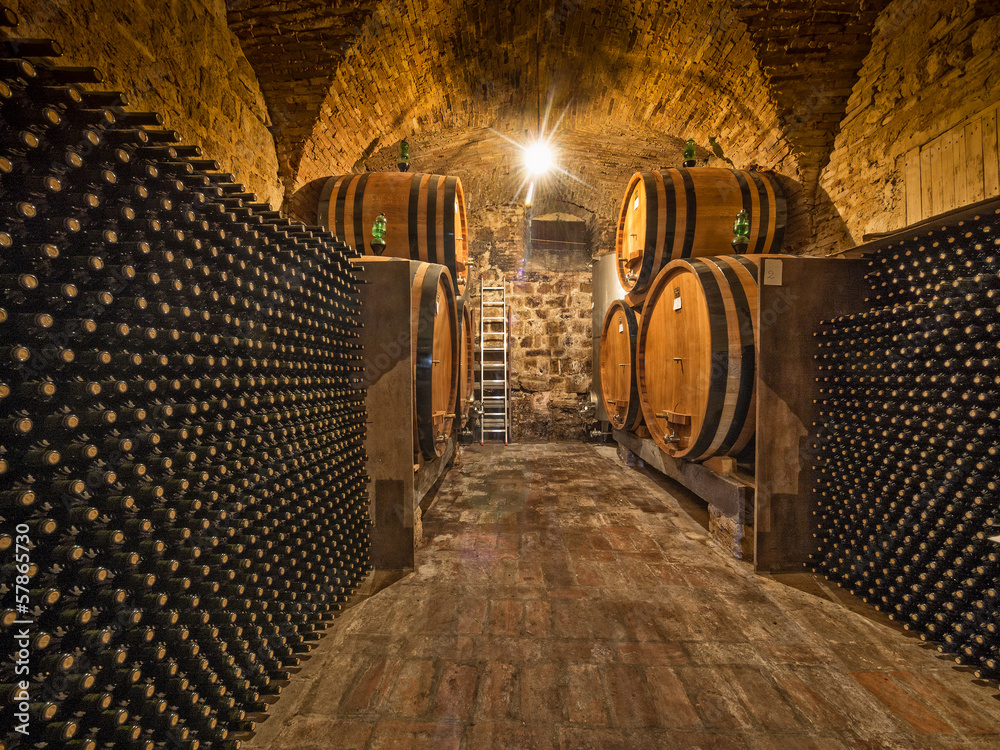 Obraz Tryptyk wine cellar with bottles and