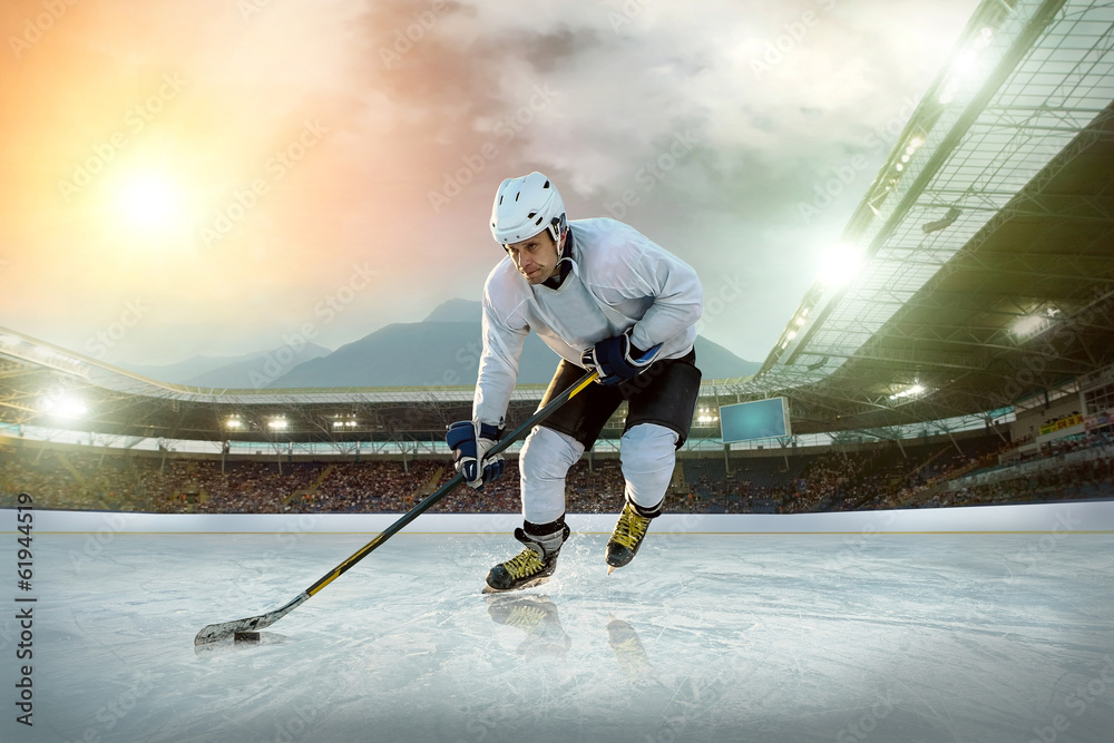 Obraz Tryptyk Ice hockey player on the ice.