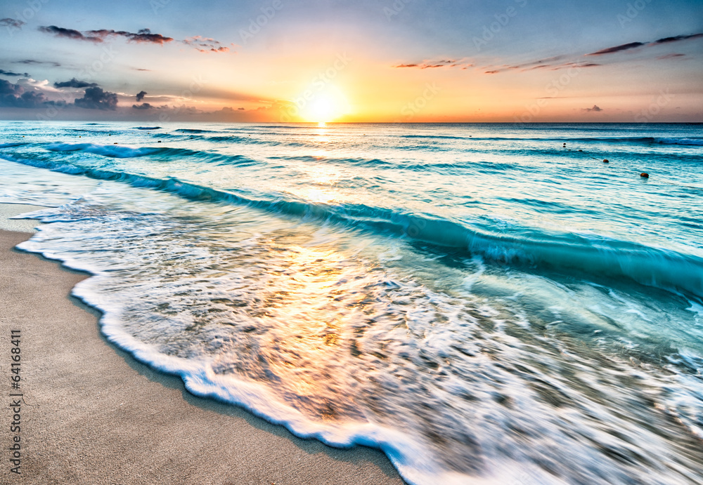 Fototapeta Sunrise over beach in Cancun