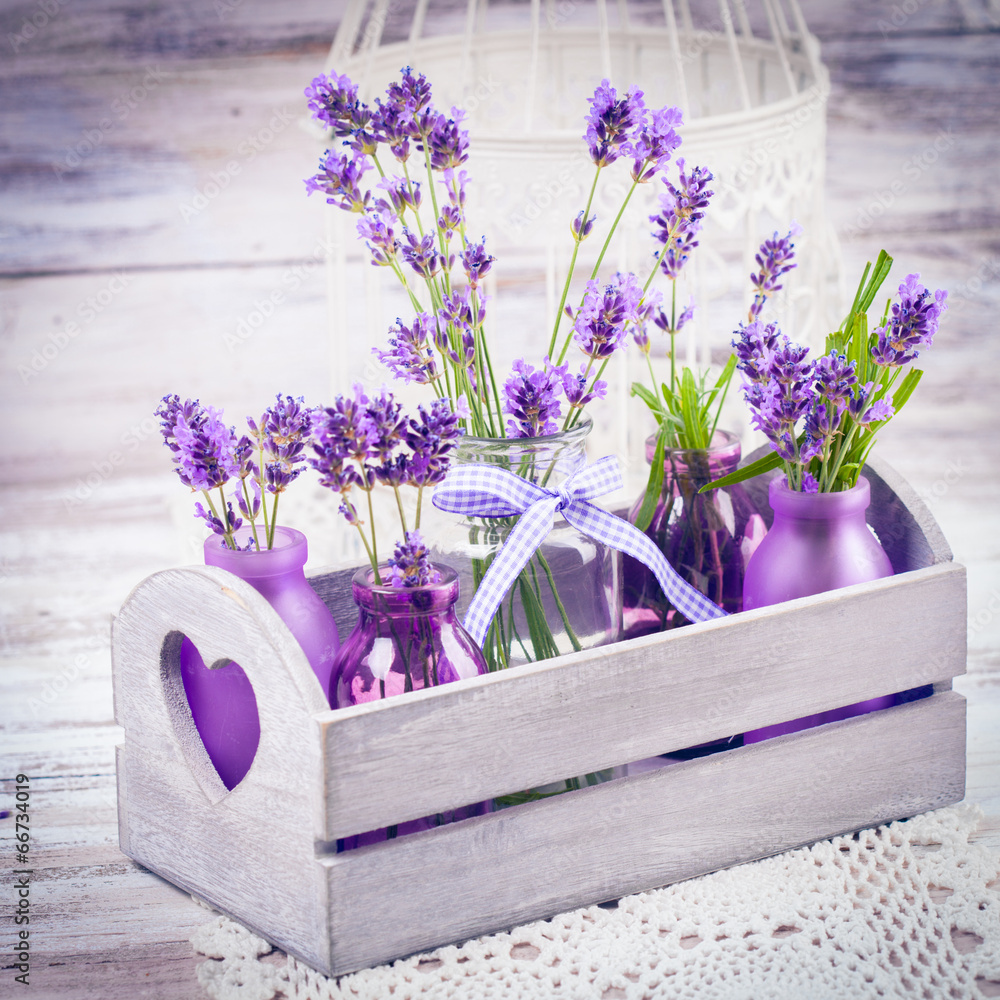 Fototapeta Lavender in bottles decor