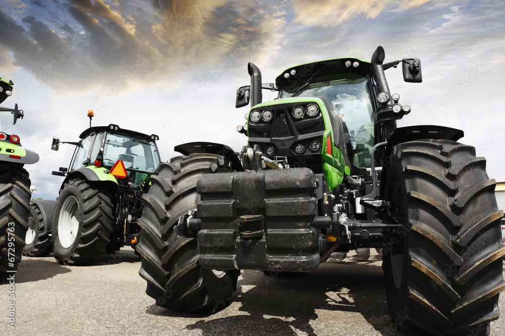 Fototapeta giant tractors set against a