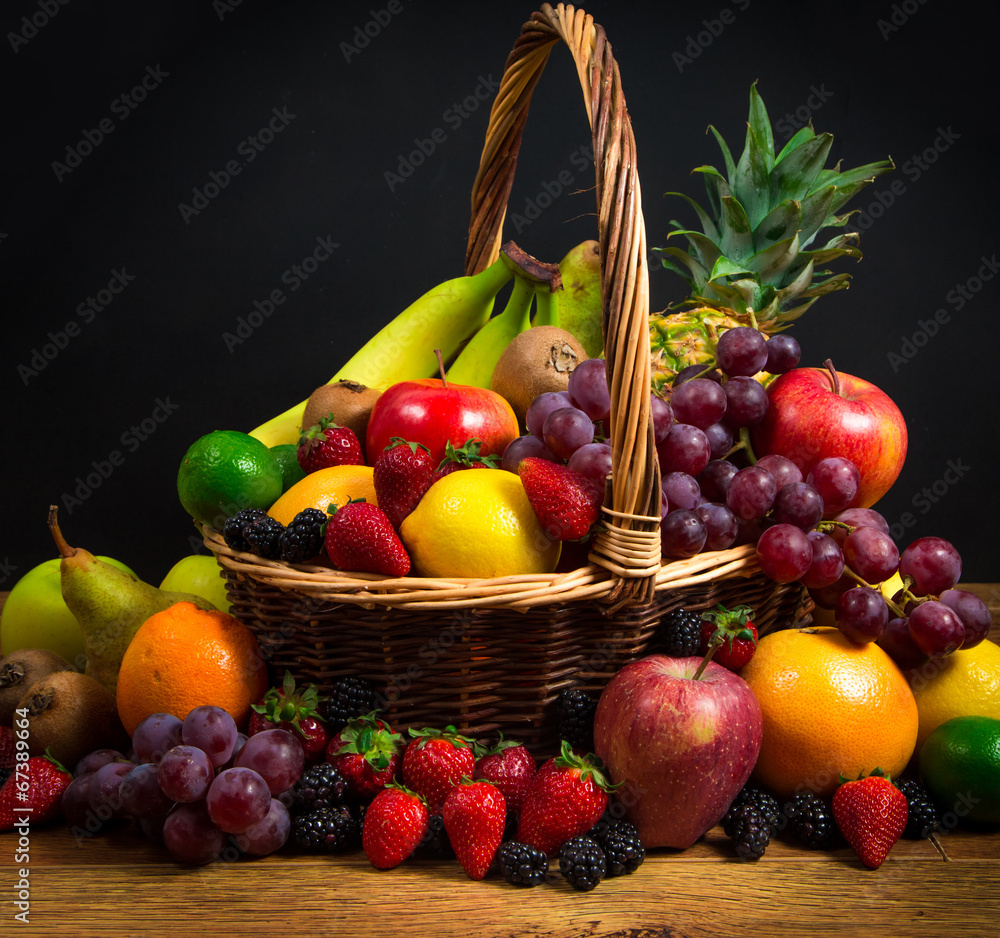 Fototapeta Mix of fresh fruits on wicker