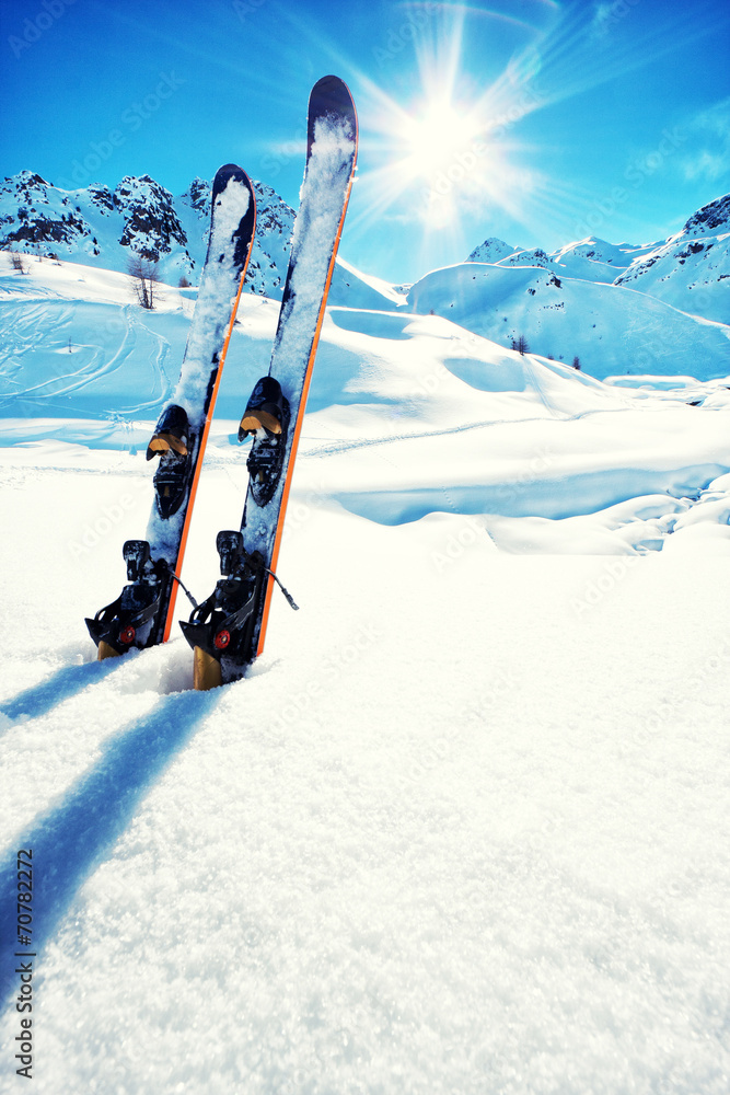 Obraz Tryptyk Skis in snow at Mountains