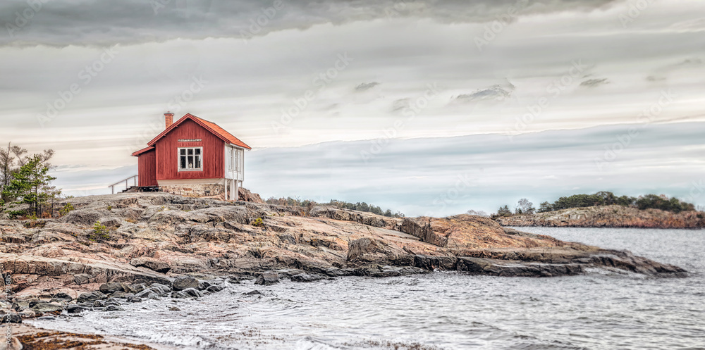 Obraz Dyptyk Red house at sea shore in dull