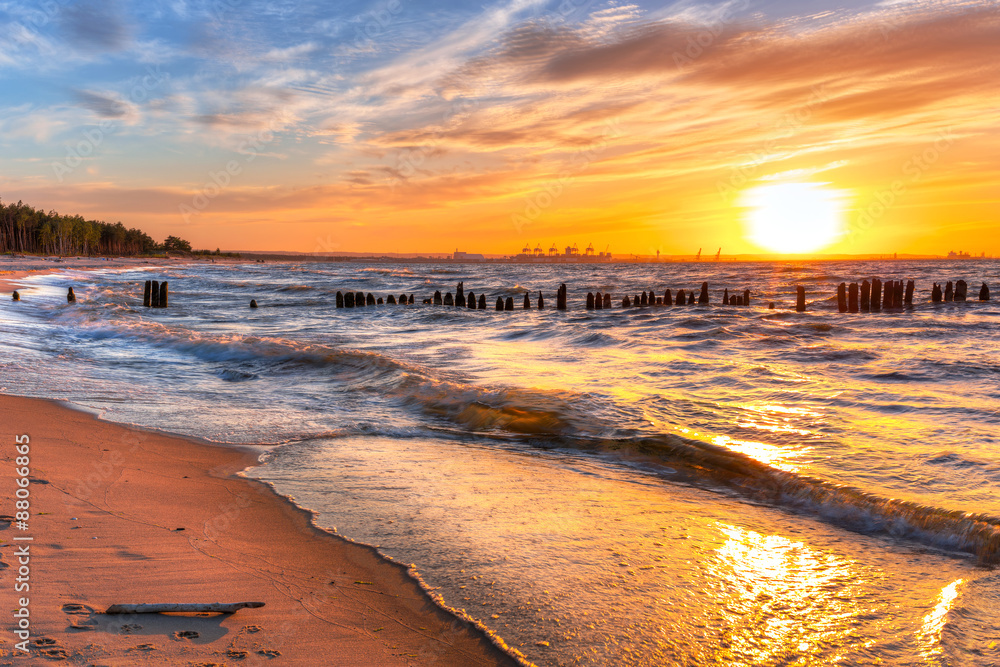 Obraz na płótnie Sunset on the beach at Baltic