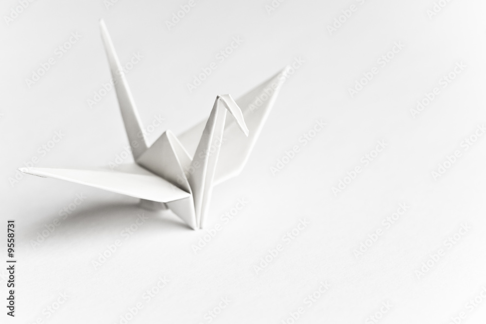 Obraz Tryptyk An origami bird on a white