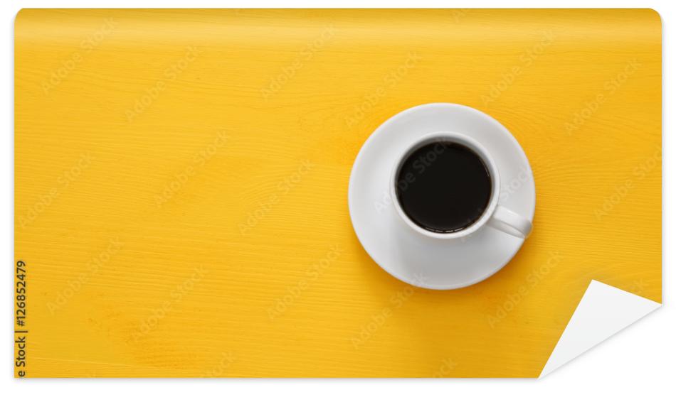 Fototapeta coffe cup on wooden yellow