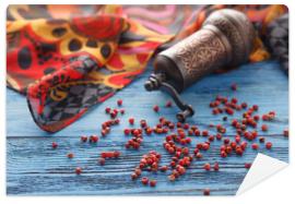 Fototapeta Red pepper on blue wooden