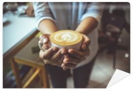 Fototapeta Woman hand holding coffe cup