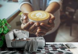 Fototapeta Woman hand holding coffe cup