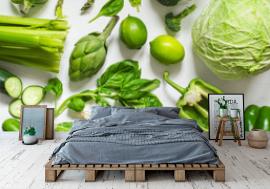 Fototapeta Green vegetables on a wooden