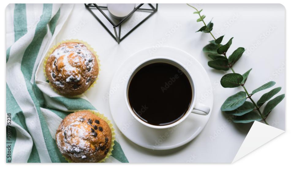 Fototapeta Coffee and two muffins on