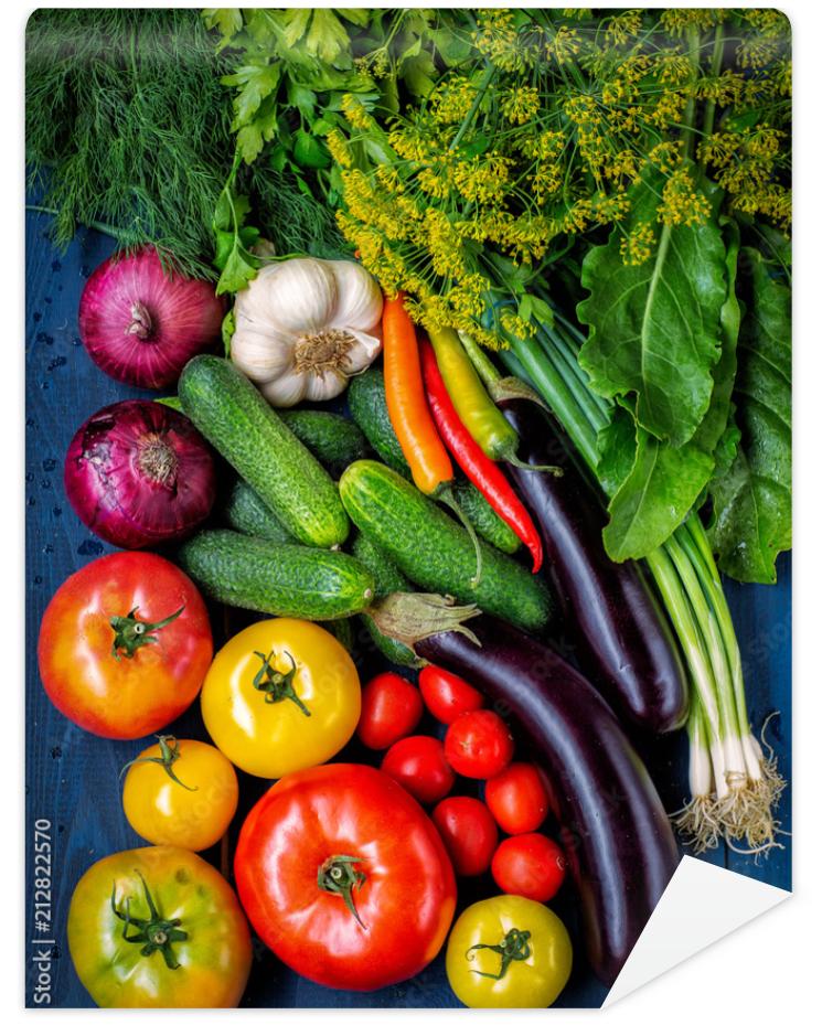 Fototapeta Assorted vegetables on a dark