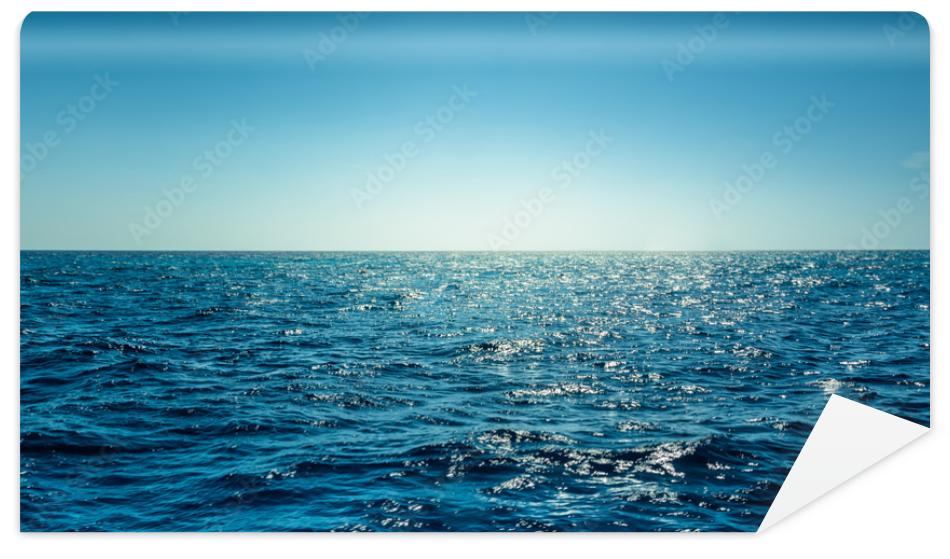 Fototapeta Blue ocean panorama with sun