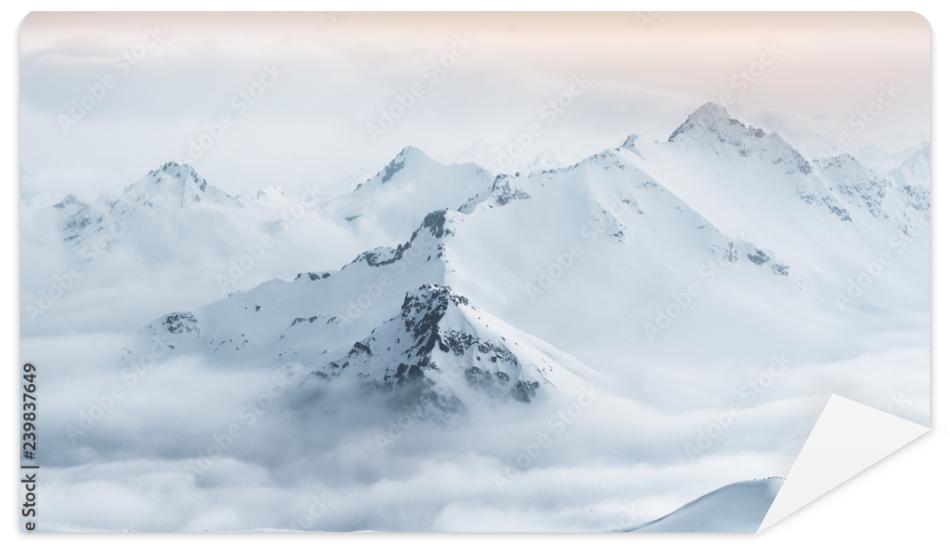 Fototapeta Snow covered mountain peaks of