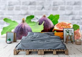 Fototapeta Fresh fruit fig in a wooden