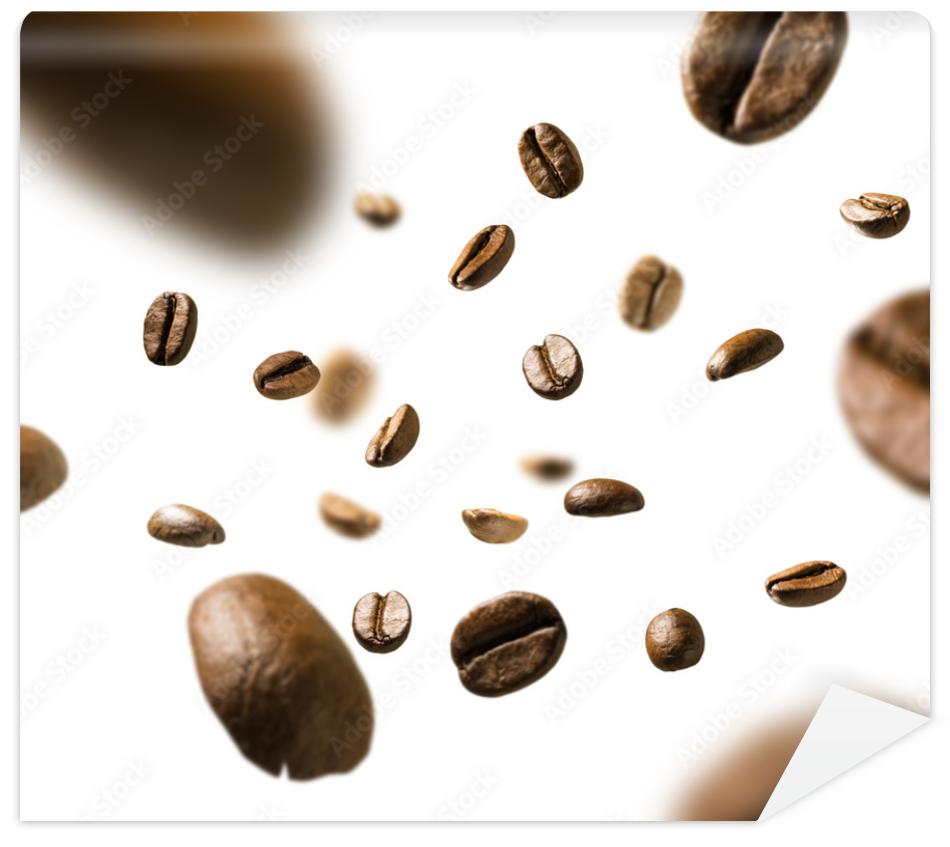 Fototapeta Coffee beans in flight on