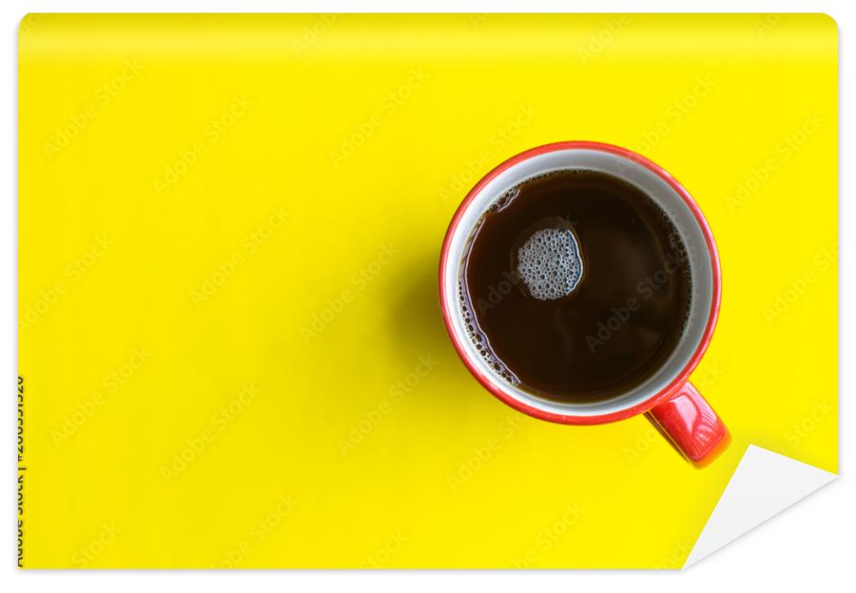 Fototapeta cup of coffee on yellow