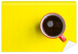 Fototapeta cup of coffee on yellow