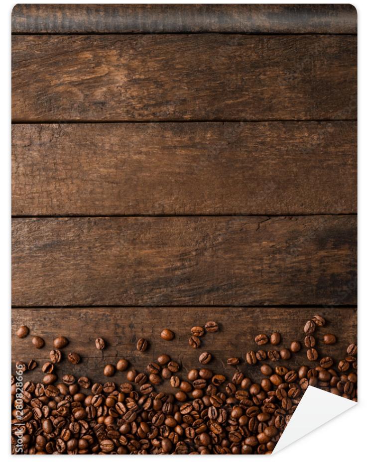 Fototapeta Coffee beans on wooden