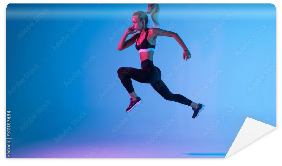 Fototapeta Sporty young woman fitness