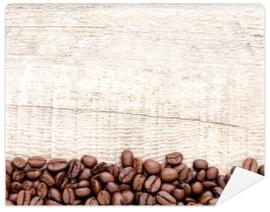 Fototapeta Coffee on wooden background.