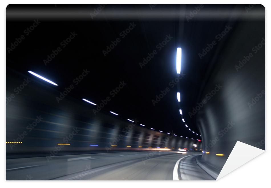 Fototapeta fast motion in dark tunnel