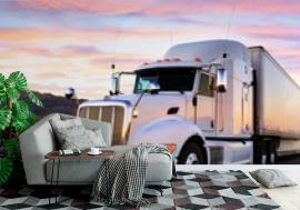 Fototapeta Truck and highway at sunset -