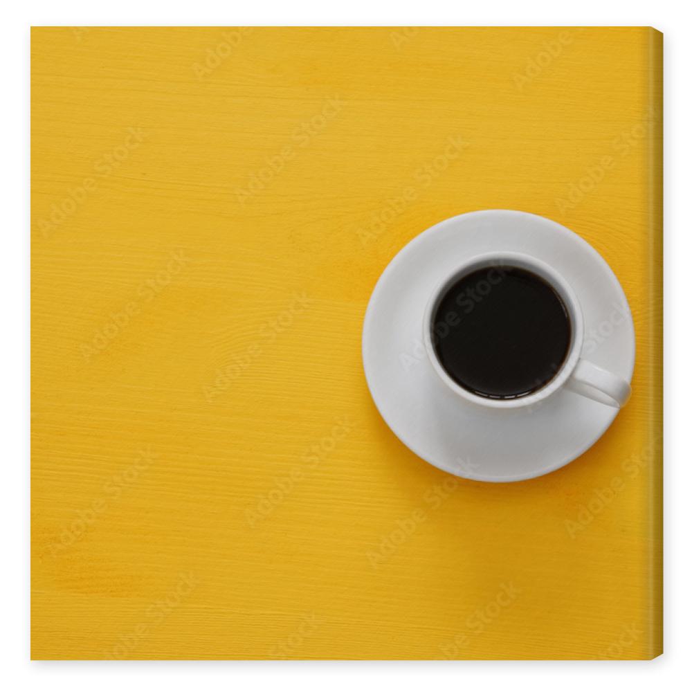 Obraz na płótnie coffe cup on wooden yellow